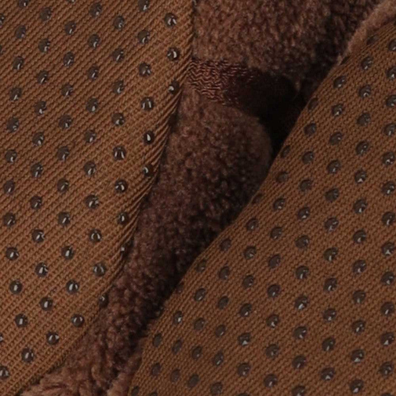 Braune Babyschuhe mit rutschhemmenden Noppen auf der weichen Sohle
