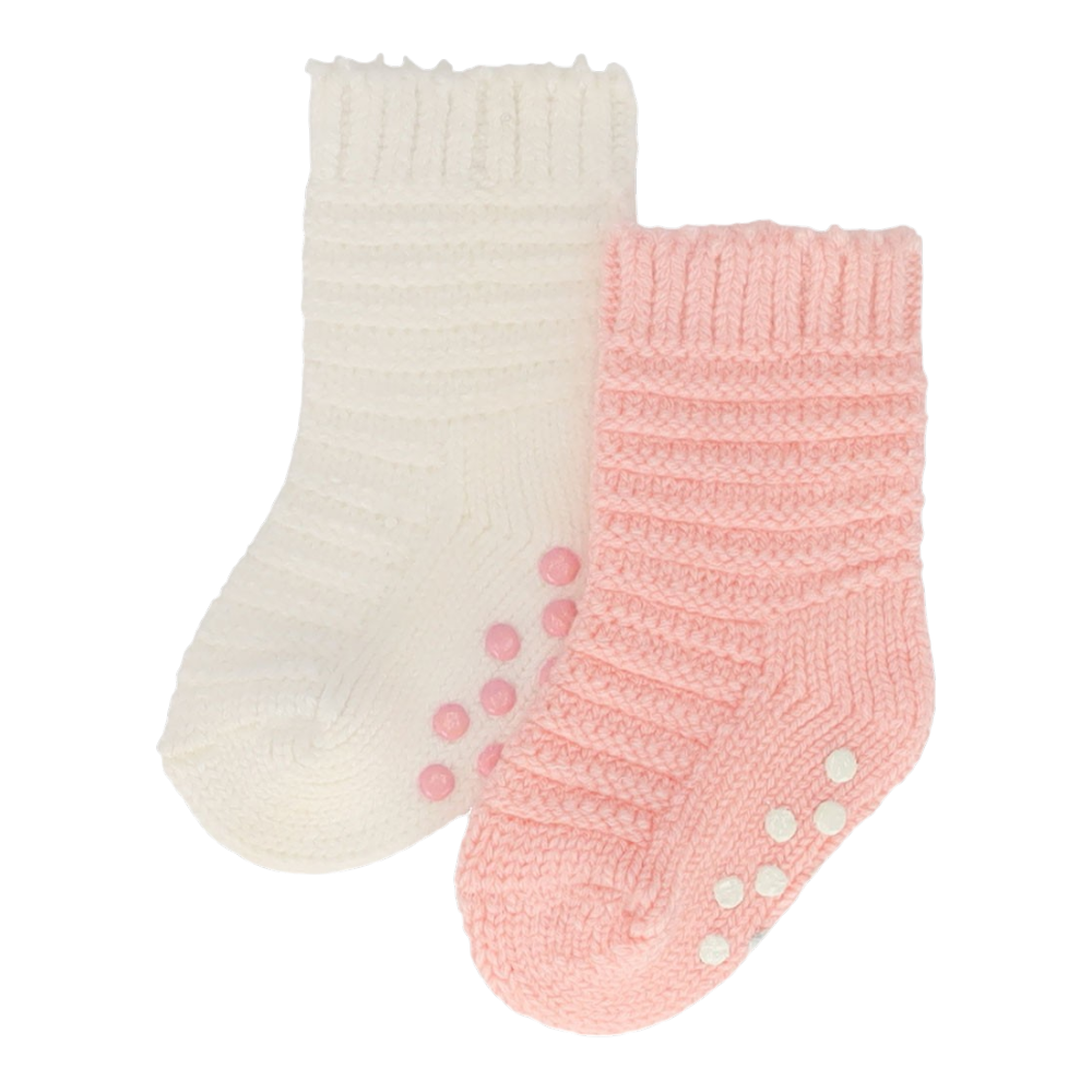 Pink baby socks with non-slip nubs on the sole