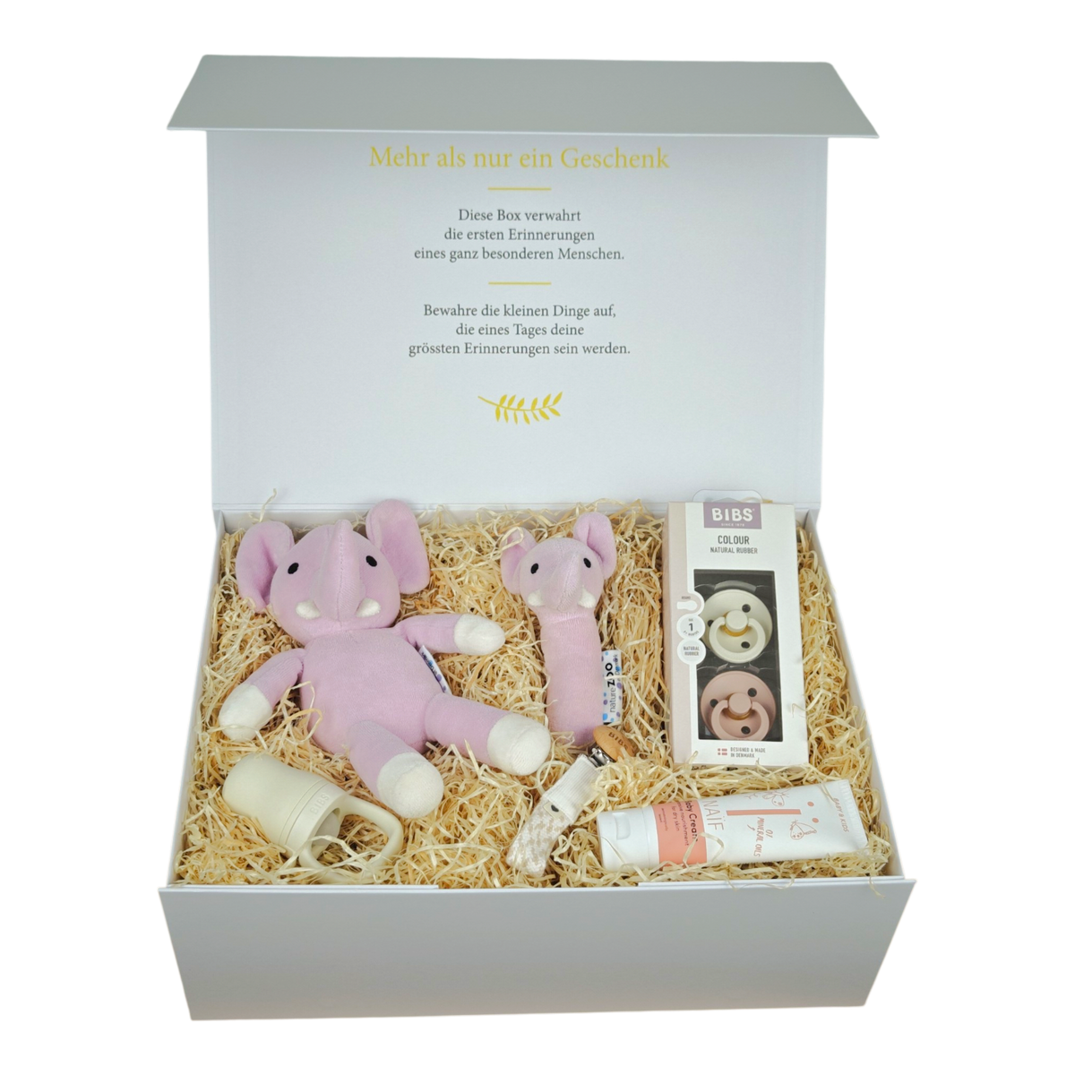 Geschenkbox Laura für Babys in Rosa und Creme mit Bio-Plüschelefant, Bio Babyrassel, BIBS Schnullern, Schnullerkette, Fruchtsauger und NAÏF Babycreme in cremeweisser Magnetbox.