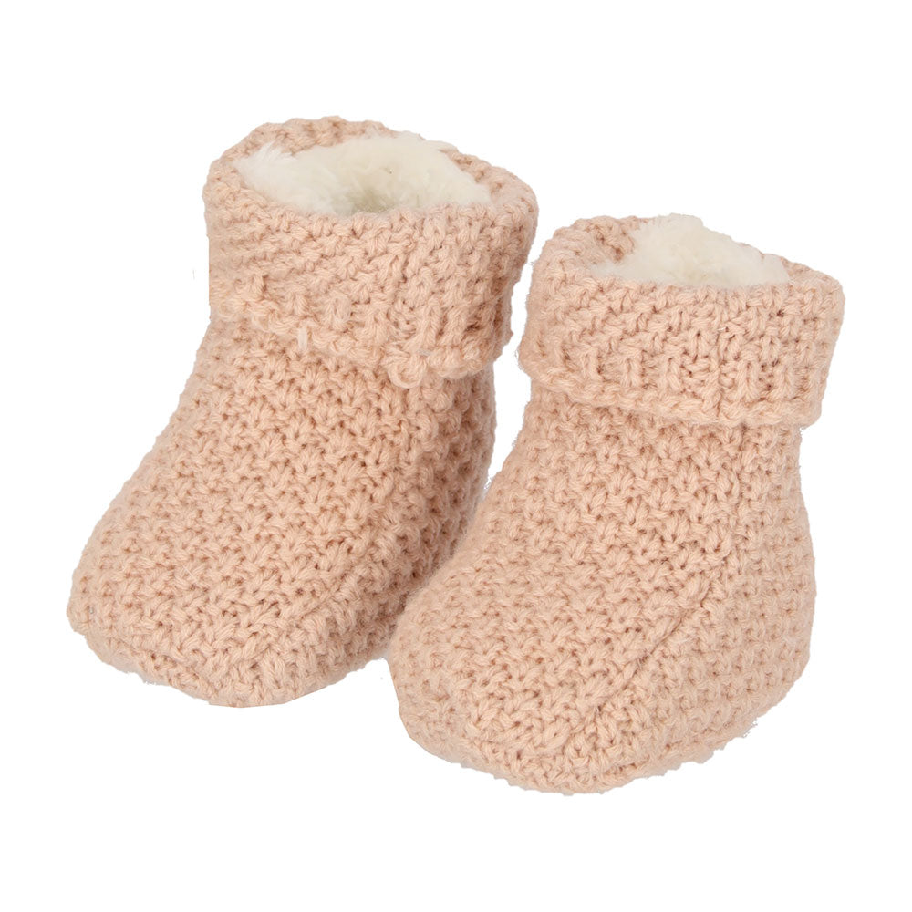 Paire de chaussons bébé tricotés vieux rose avec doublure blanche toute douce