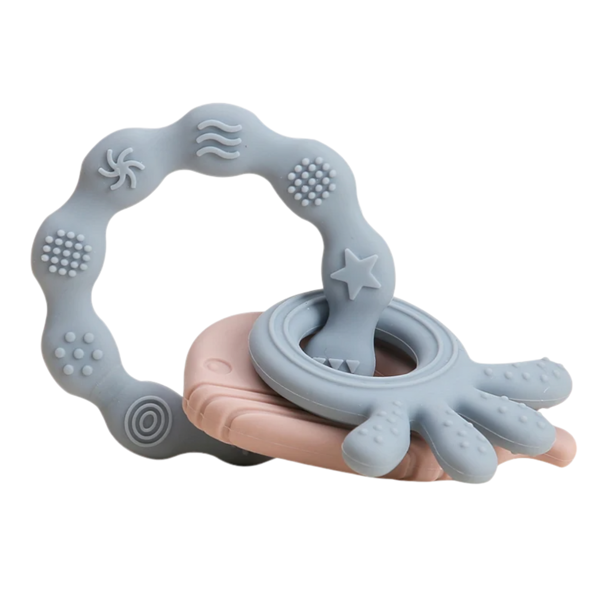 Der Hello World Beissring Walfisch Blau (10,5x7cm) ist ein BPA-freier Silikon-Beissring in Pastellblau mit verschiedenen Texturen und Mustern, ideal für ein beruhigendes Zahnen und sensorisches Erlebnis für Babys.