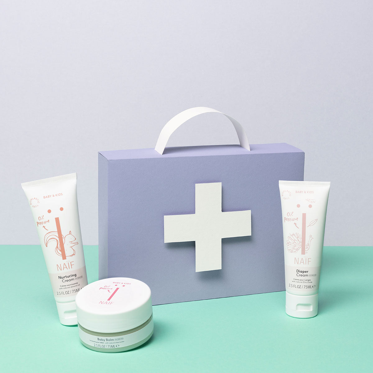 Naïf Baby & Kids Windelcreme als Teil einer hochwertigen Babypflegeserie mit Pflegecreme und Babybalsam.