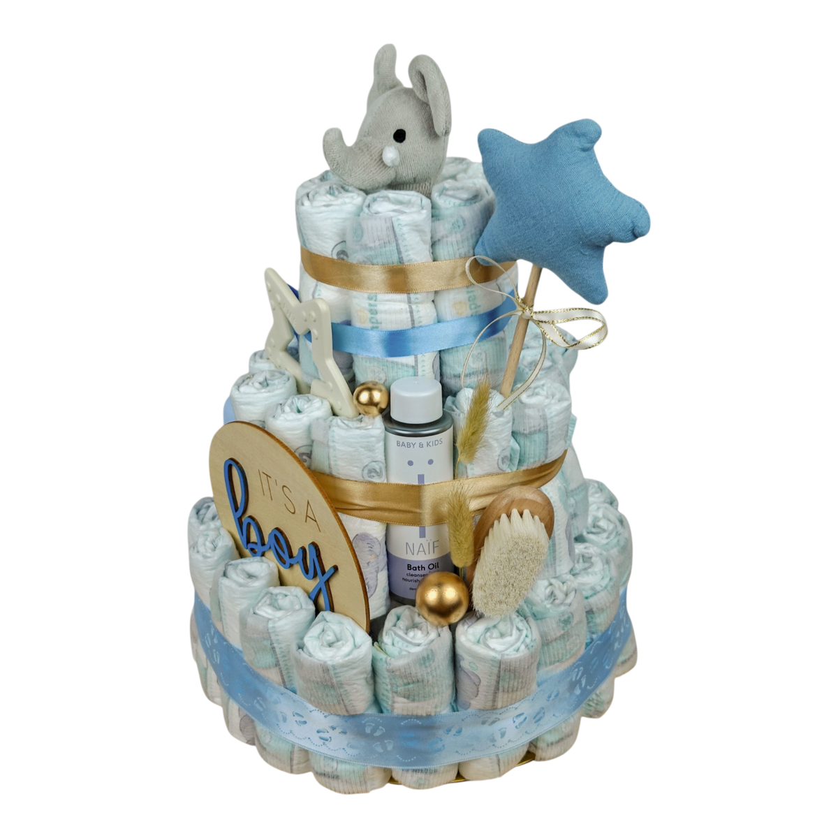 Gâteau de couches C'est un garçon – vue latérale avec huile de bain NAÏF, brosse à cheveux pour bébé et anneau de dentition BIBS