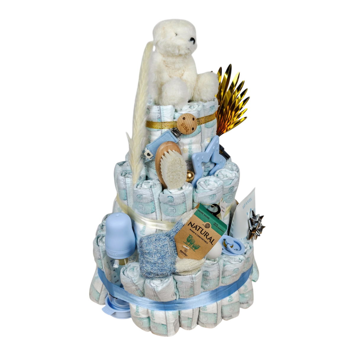 Diaper cake Milo as a baby gift for boys with teddy bear, BIBS accessories, NAÏF care and light blue accents - side view on the left.