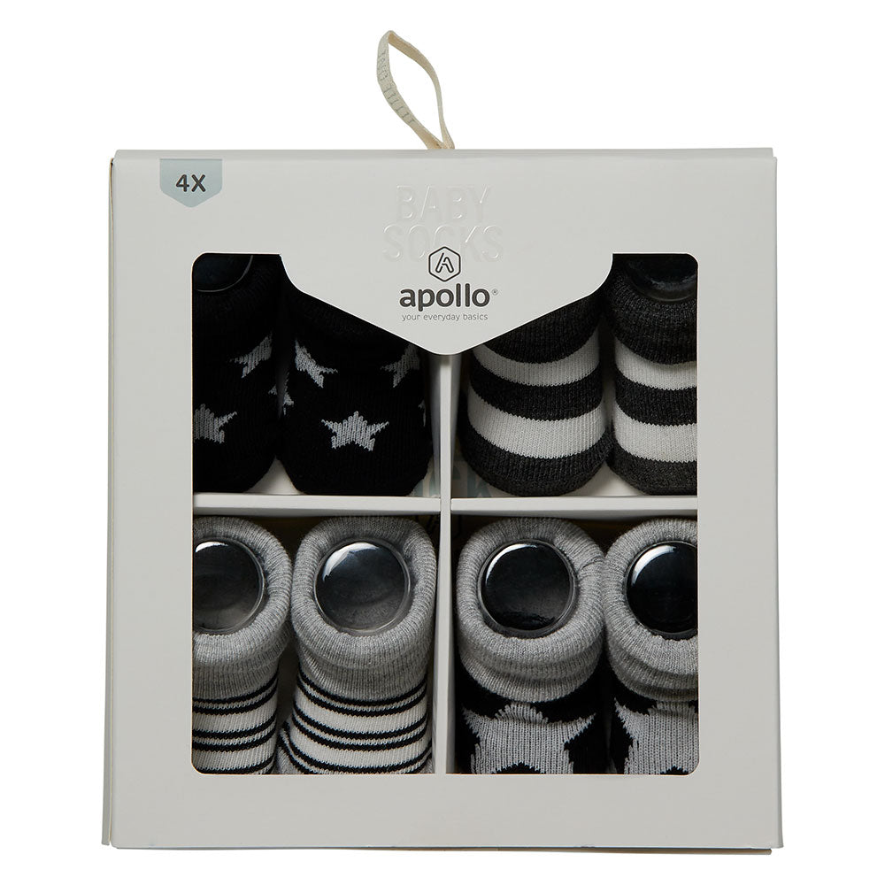 Vier Paar Babysocken mit Sternen und Streifen in Geschenkbox