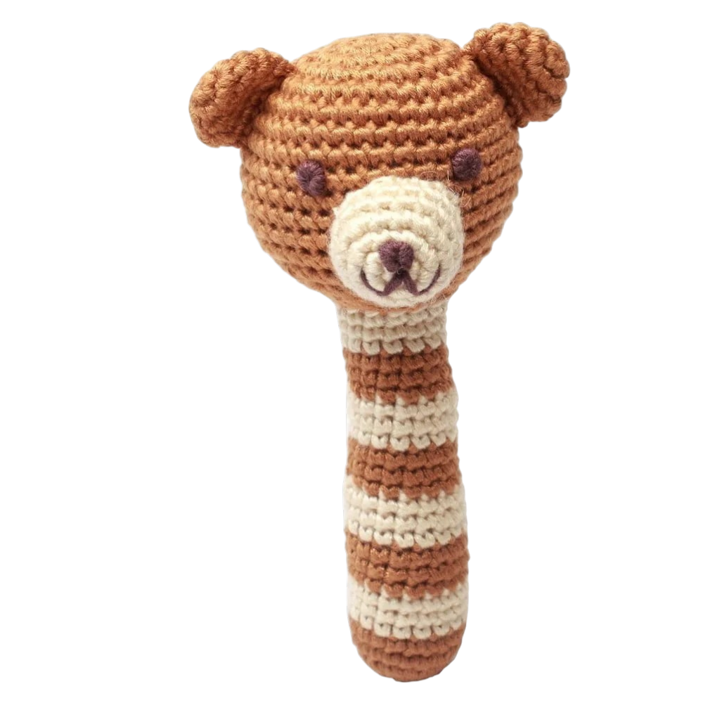 Hand-crocheted baby rattle bear in light brown with soft bamboo yarn and gentle natural colors for babies from birth.