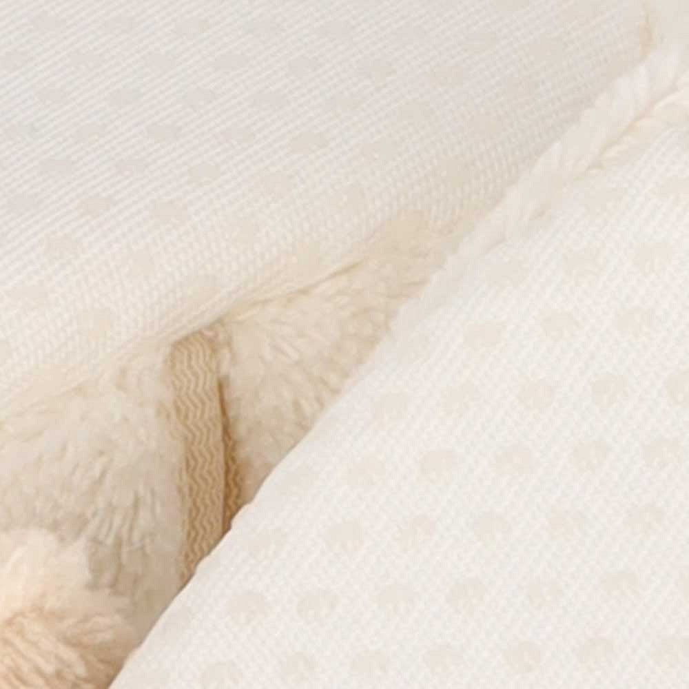 Vue détaillée des chaussons bébé souples mouton d'Apollo en blanc et beige