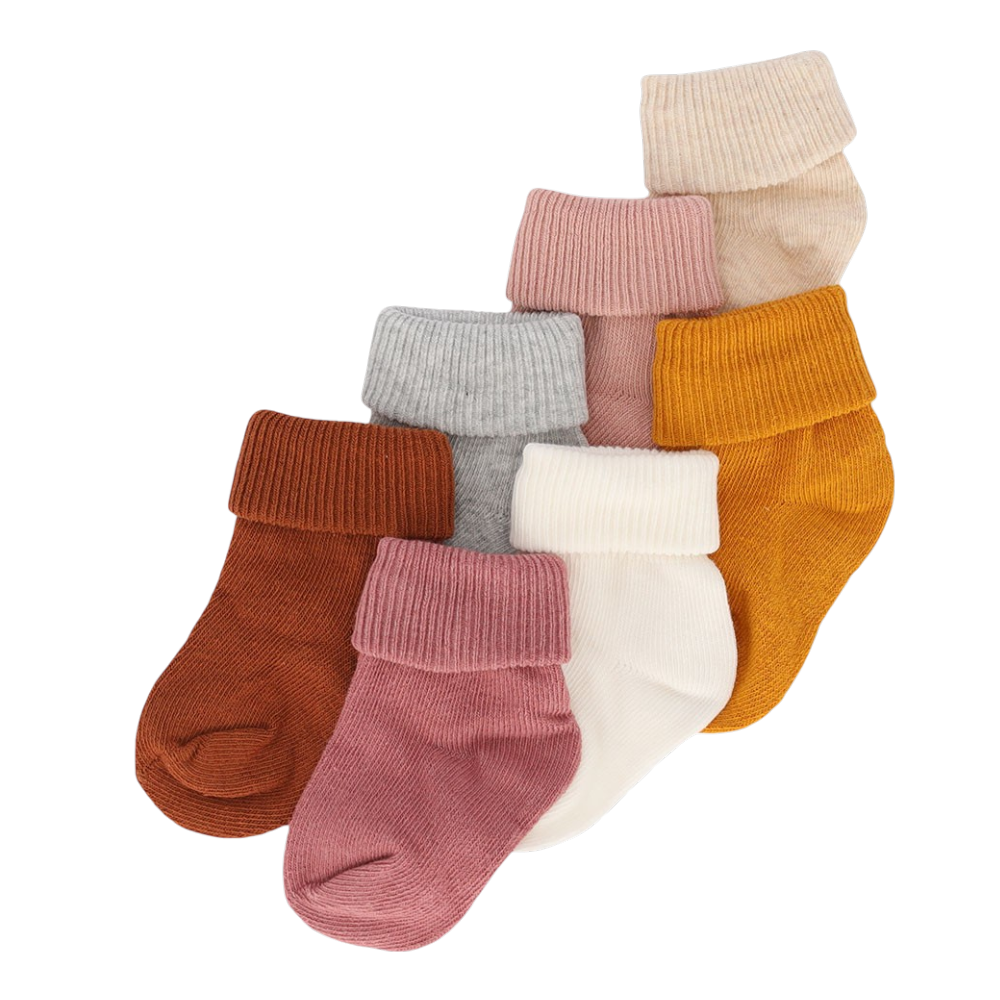 Sept chaussettes bébé en coton aux tons rose, crème, gris et chauds d'Apollo