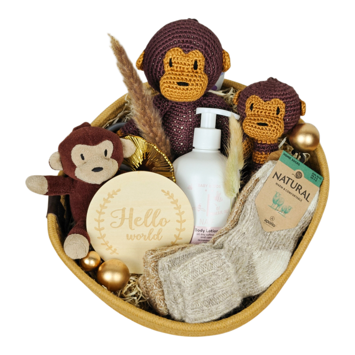 Baby gift basket Kian in a natural-colored cotton basket with natureZOO monkeys, wool socks and NAÏF body lotion