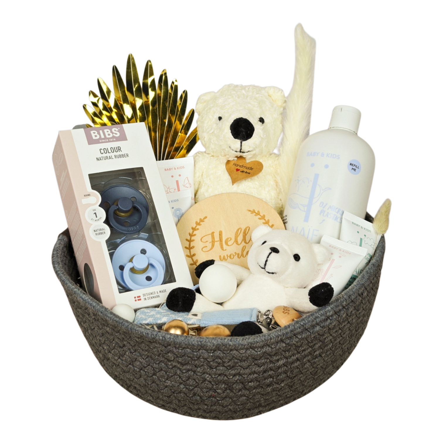 Nevio gift basket with BIBS pacifiers, NAÏF baby care, teddy bears, pacifier chain and baby accessories in blue and cream.