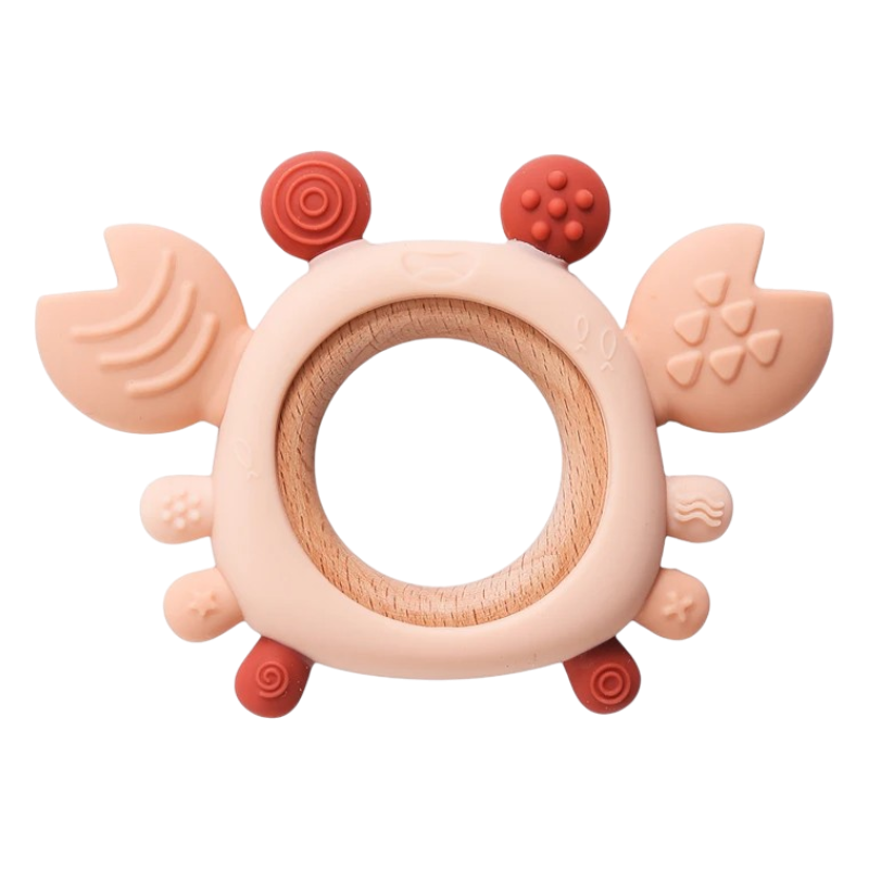 Der Hello World Beissring Krabbe Beige [11,5 x 8 cm] ist ein Beißspielzeug für Babys mit einem Holzring, strukturierten Krallen und holprigen Beinen für eine beruhigende Wirkung.