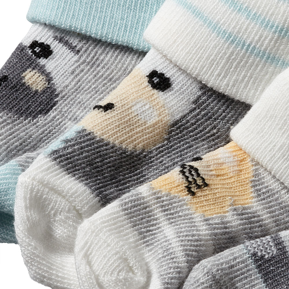Nahaufnahme der weichen Baumwollmischung und Tiermotive der Apollo Babysocken
