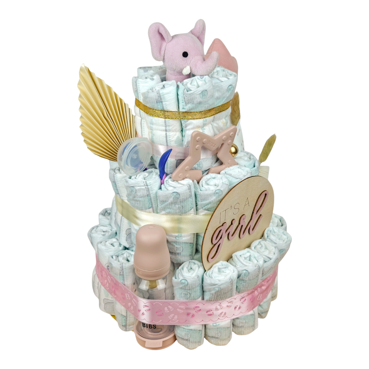 Vista laterale della torta di pannolini It's a Girl con accessori rosa per bambini, biberon BIBS e stella con anello da dentizione