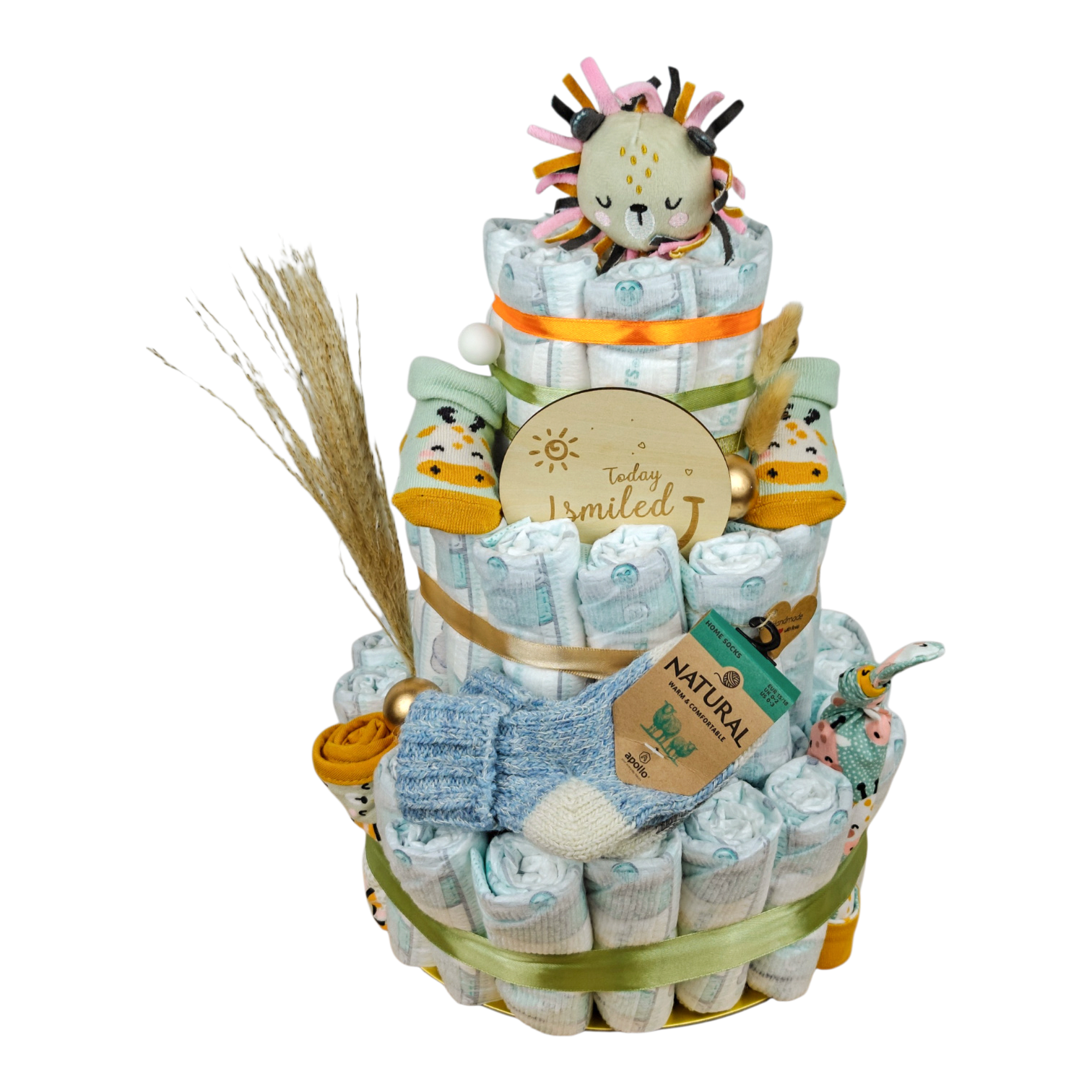 Gâteau de couches Léon avec 60 pampers, coffret cadeau jungle, doudou lion, chaussettes bébé et chaussettes en laine