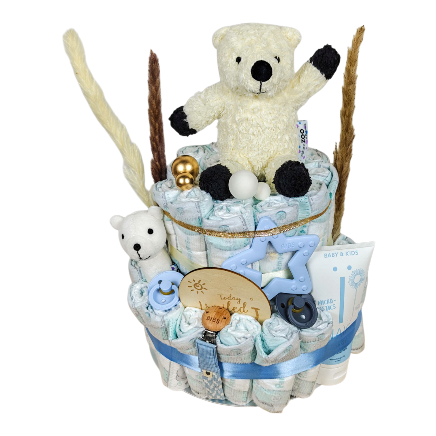 Gâteau de couches Ruan avec 53 pampers, peluche bio ours polaire, hochet bébé, tétines BIBS, anneau de dentition étoile, chaîne tétine et gel lavant NAÏF